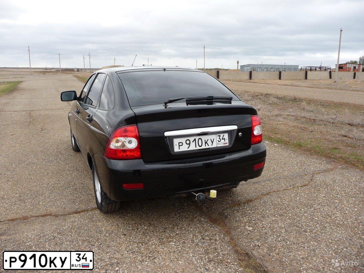 Фото автомобиля LADA 2172 PRIORA, 2011 — госномер Р910КУ34. Цвет: Сине-Черный