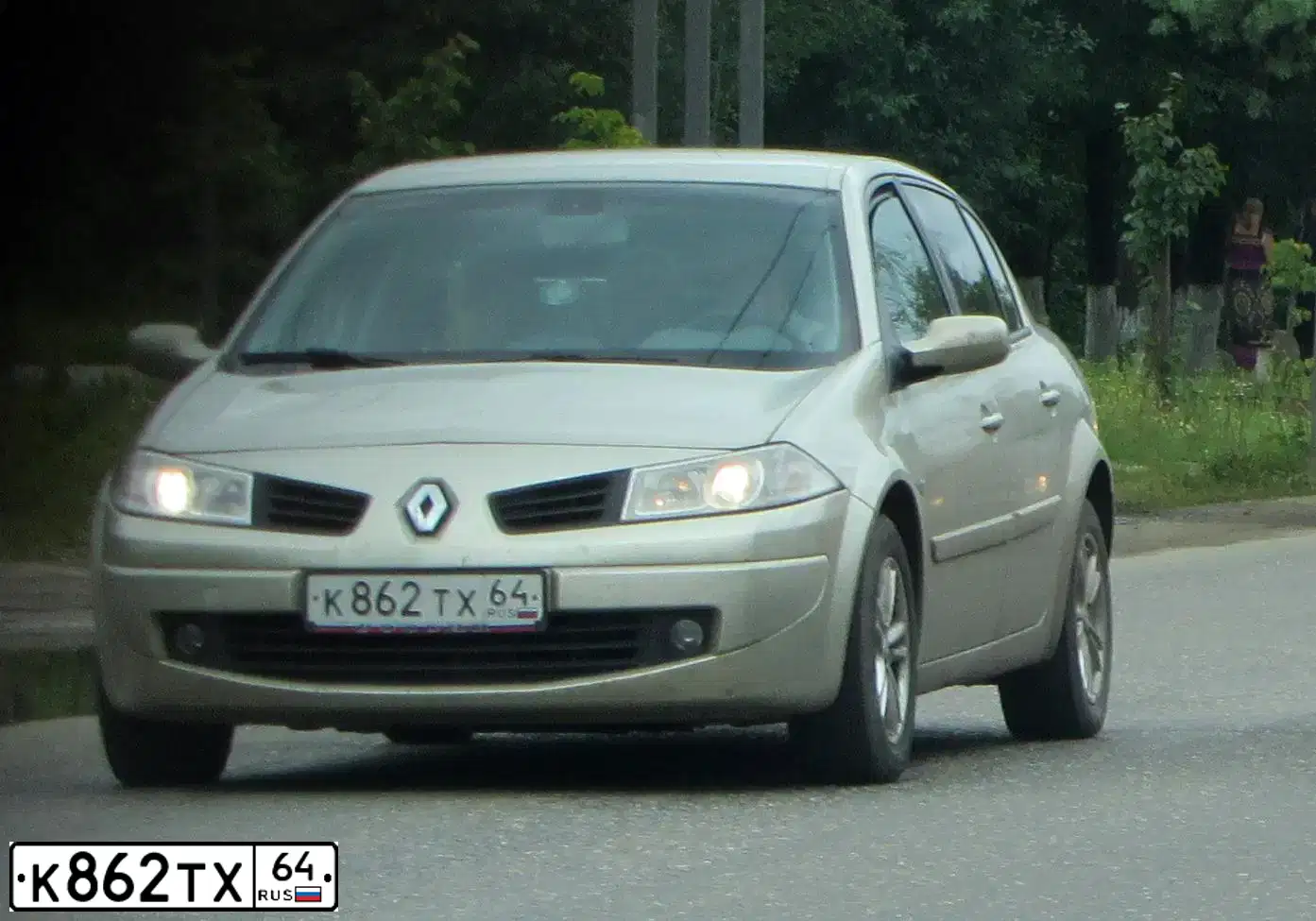 Фото автомобиля LADA 2112, 2006 — госномер Е749МЕ164. Цвет: СЕРЕБРИСТО-БЕЖЕВЫЙ
