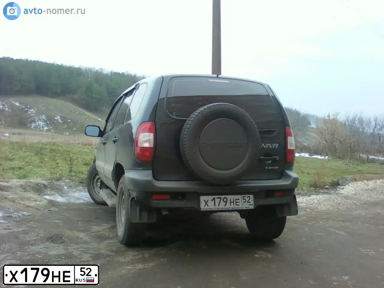 Фото автомобиля CHEVROLET NIVA, 2008 — госномер Х179НЕ52. Цвет: ЧЕРНО-СИНИЙ