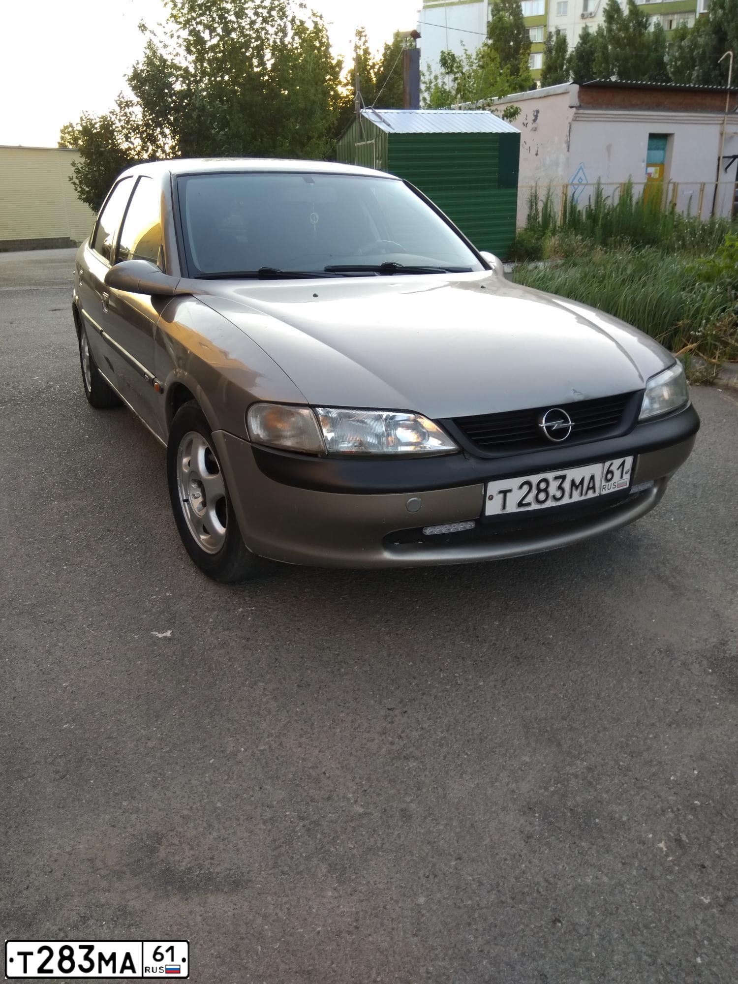 Фото автомобиля OPEL VECTRA, 1997 — госномер Н784НО761. Цвет: СЕРО-ЗОЛОТИСТЫЙ