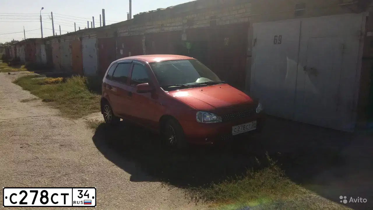 Фото автомобиля LADA 1119 KALINA, 2011 — госномер Е270МТ134. Цвет: СЕРЕБРИСТО КРАСНЫЙ