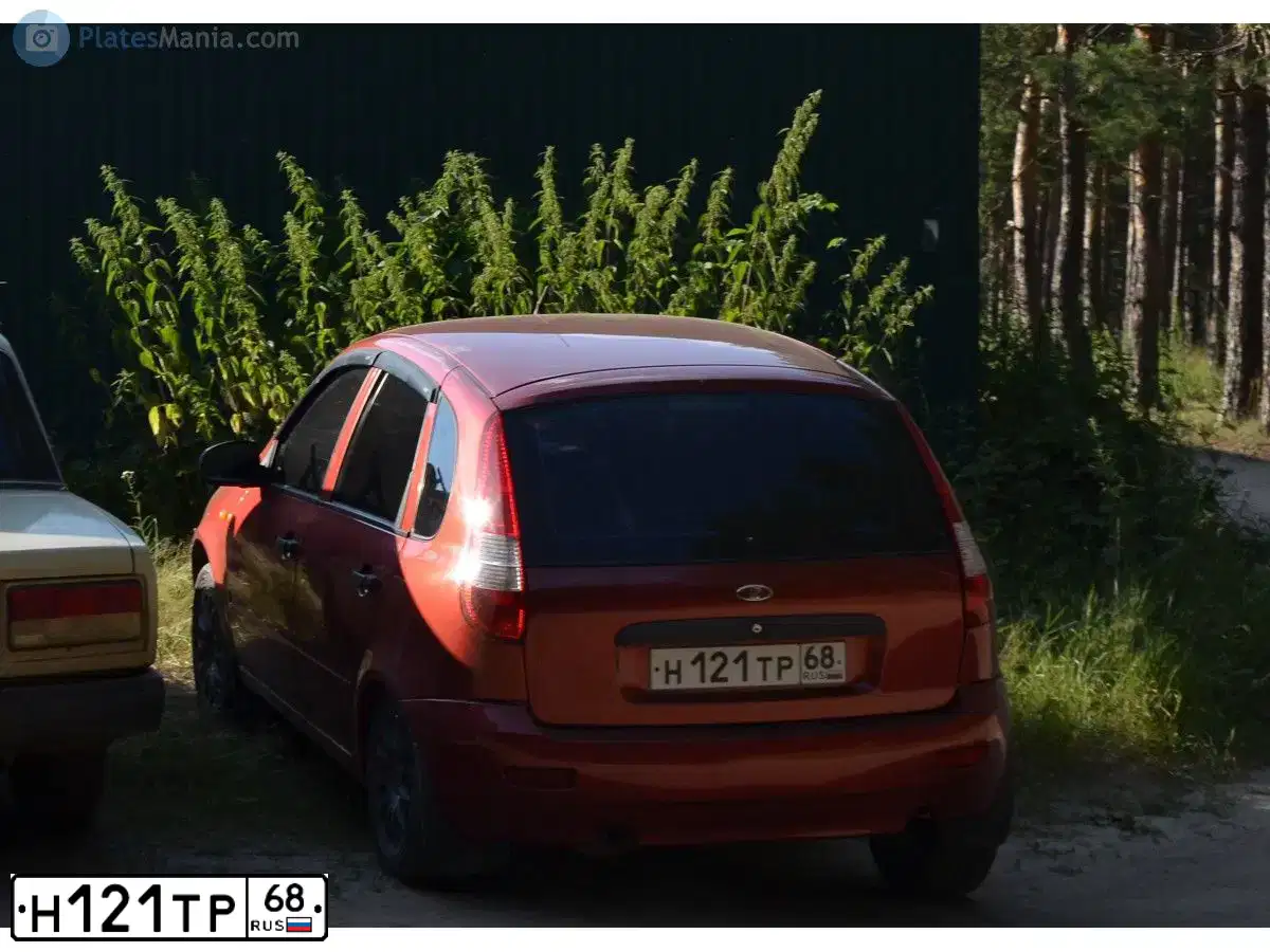 Фото автомобиля LADA 1119 KALINA, 2006 — госномер М210НВ68. Цвет: СЕРЕБРИСТО-КРАСНЫЙ