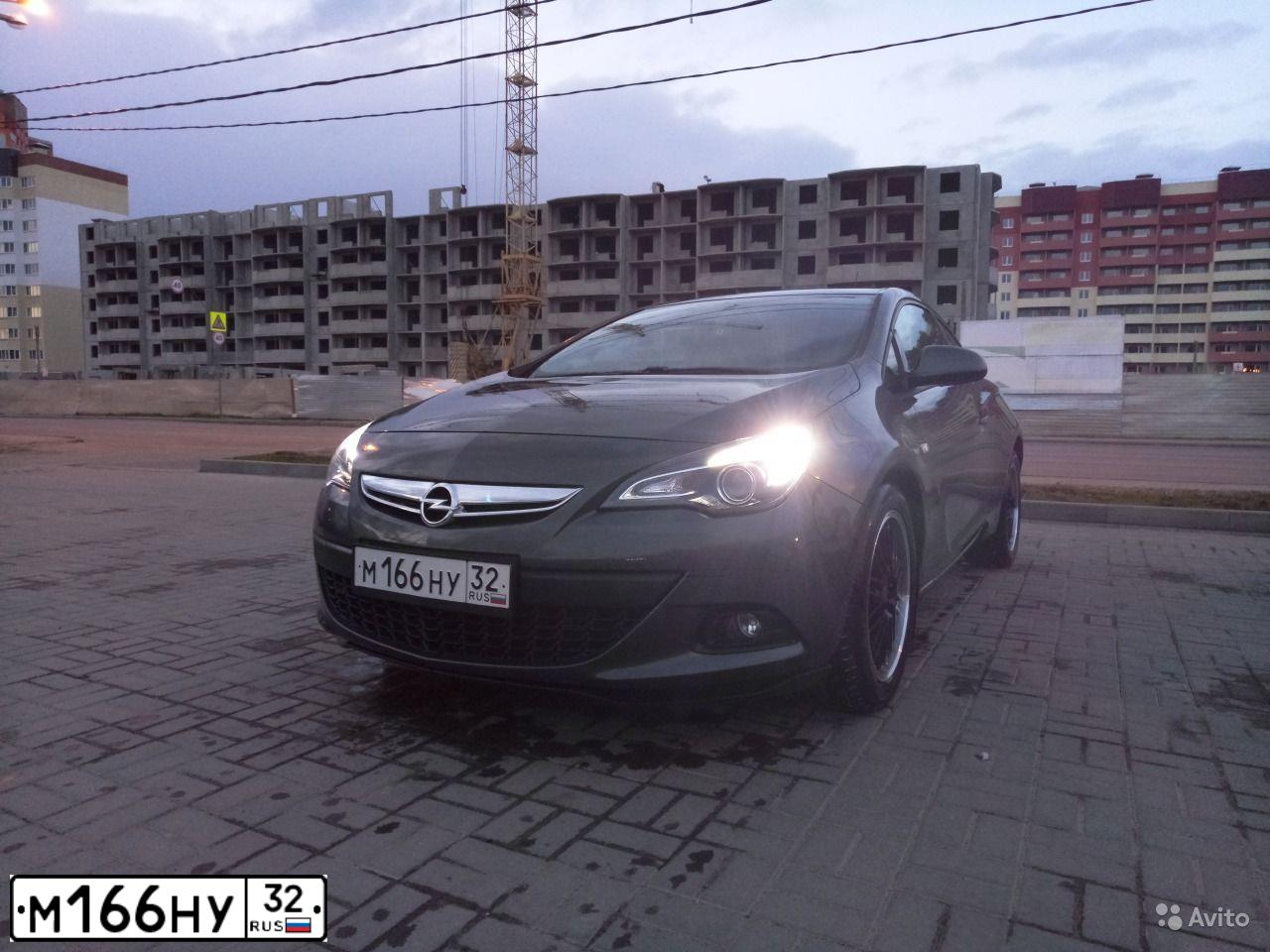 Фото автомобиля ОПЕЛЬ АСТРА GTC P-J/SW, 2012 — госномер Т406РТ152. Цвет: ТЕМНО-СЕРЫЙ