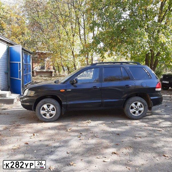 Фото автомобиля TAGAZ SANTA FE CLASSIC, 2012 — госномер К282УР26. Цвет: ЧЕРНЫЙ