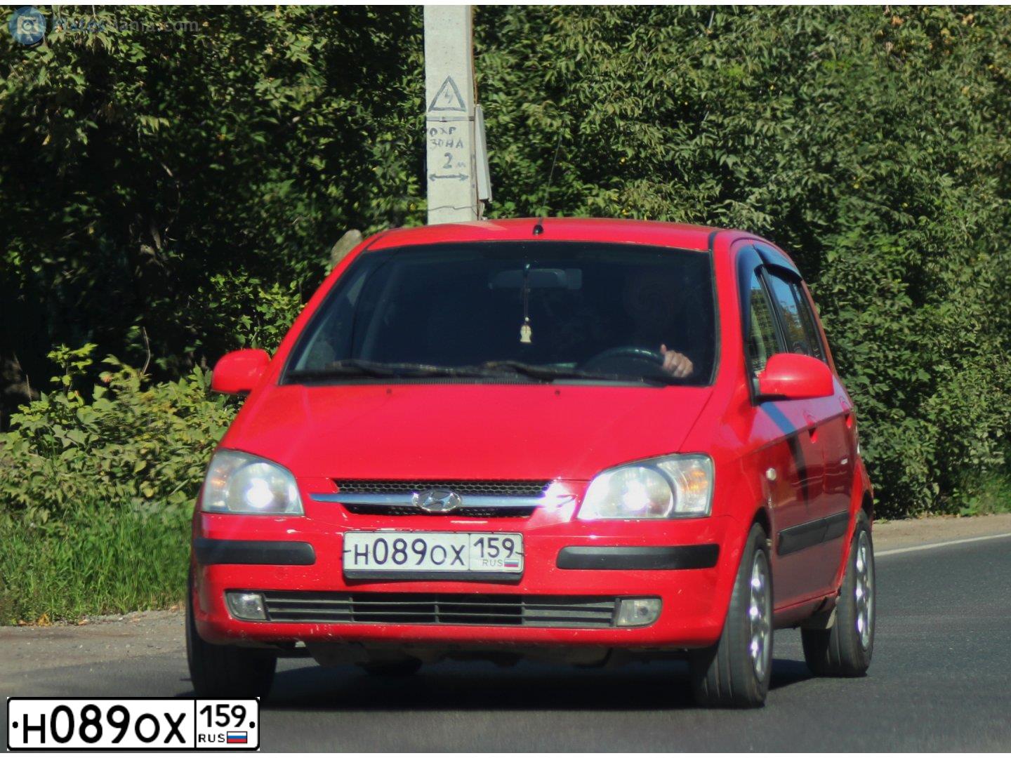 Фото автомобиля HYUNDAI GETZ, 2004 — госномер Н089ОХ159. Цвет: ЯРКО-КРАСНЫЙ