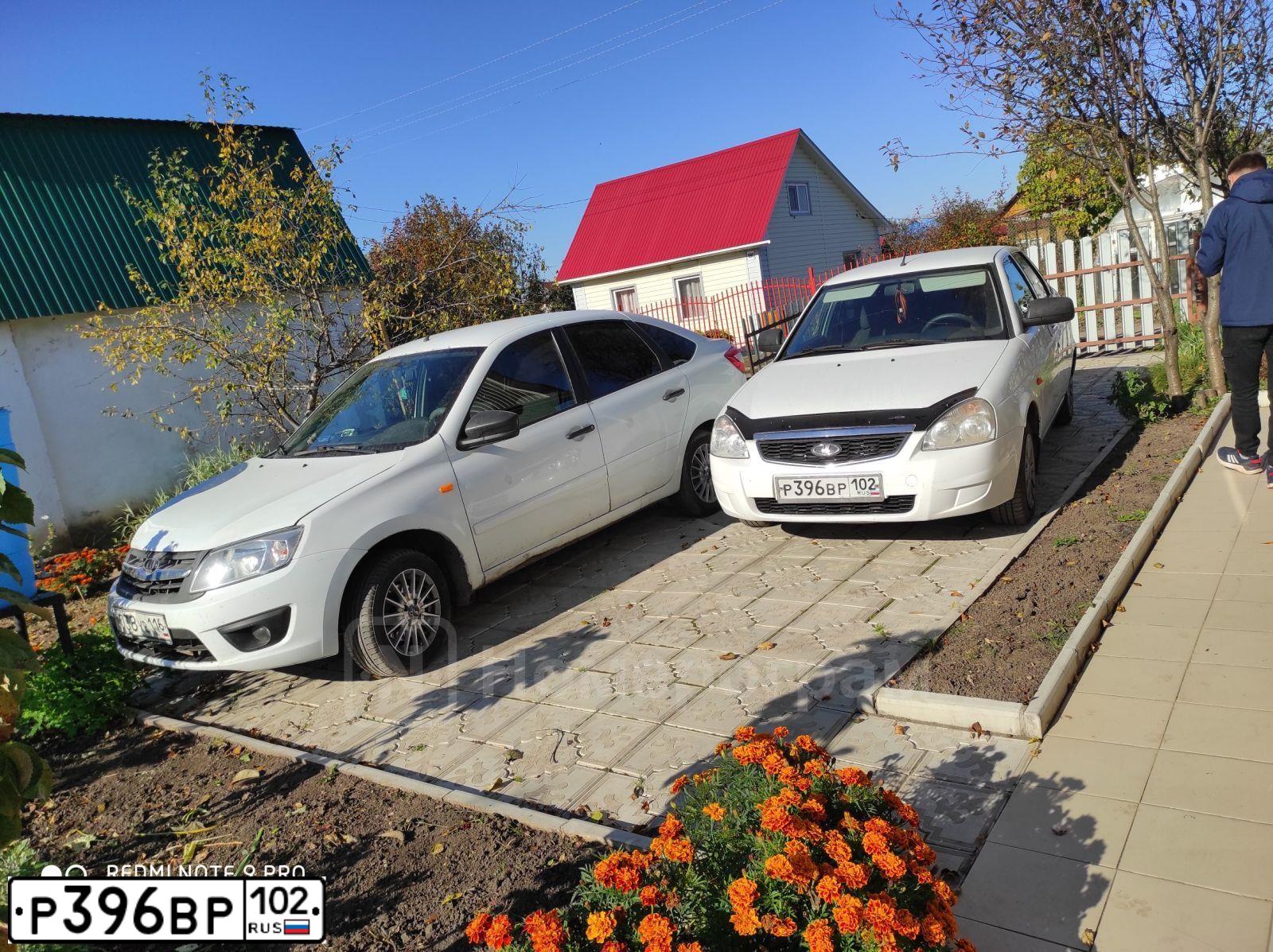 Фото автомобиля LADA 2172 PRIORA, 2013 — госномер М911ВМ702. Цвет: Белый