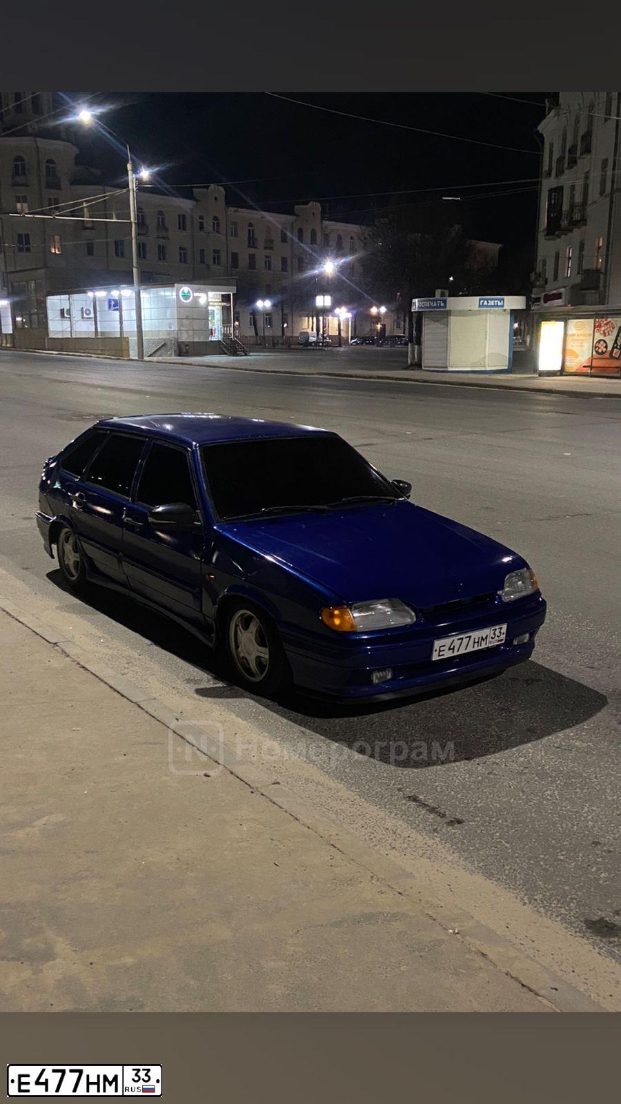 Фото автомобиля LADA 2114 SAMARA, 2004 — госномер Е477НМ33. Цвет: СЕРЕБРИСТЫЙ ЯРКО-СИНИЙ