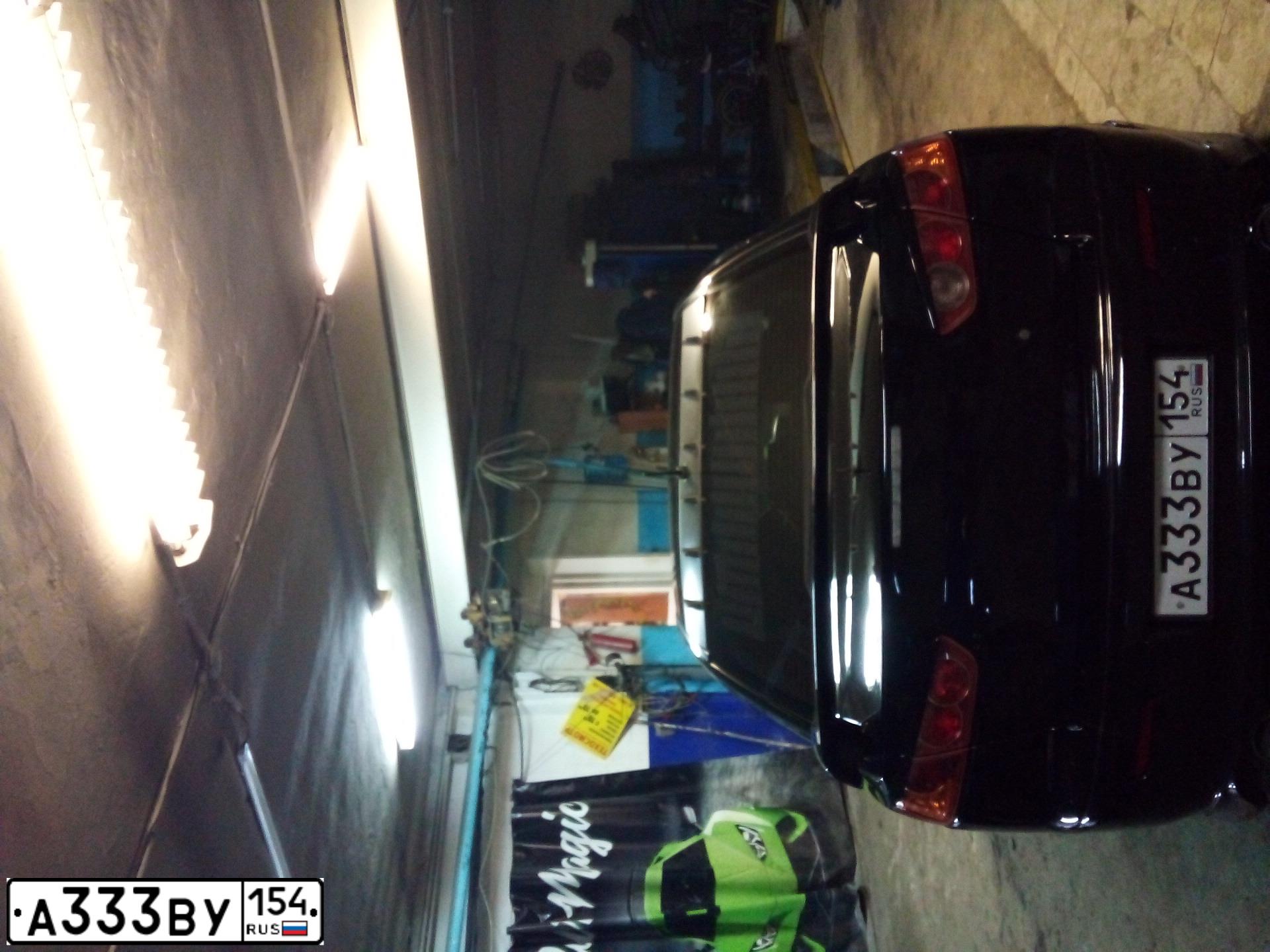 Фото автомобиля MITSUBISHI LANCER, 2008 — госномер А333ВУ154. Цвет: ЧЕРНЫЙ