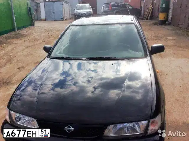 Фото автомобиля NISSAN ALMERA, 1998 — госномер А677ЕН51. Цвет: ЧЕРНЫЙ