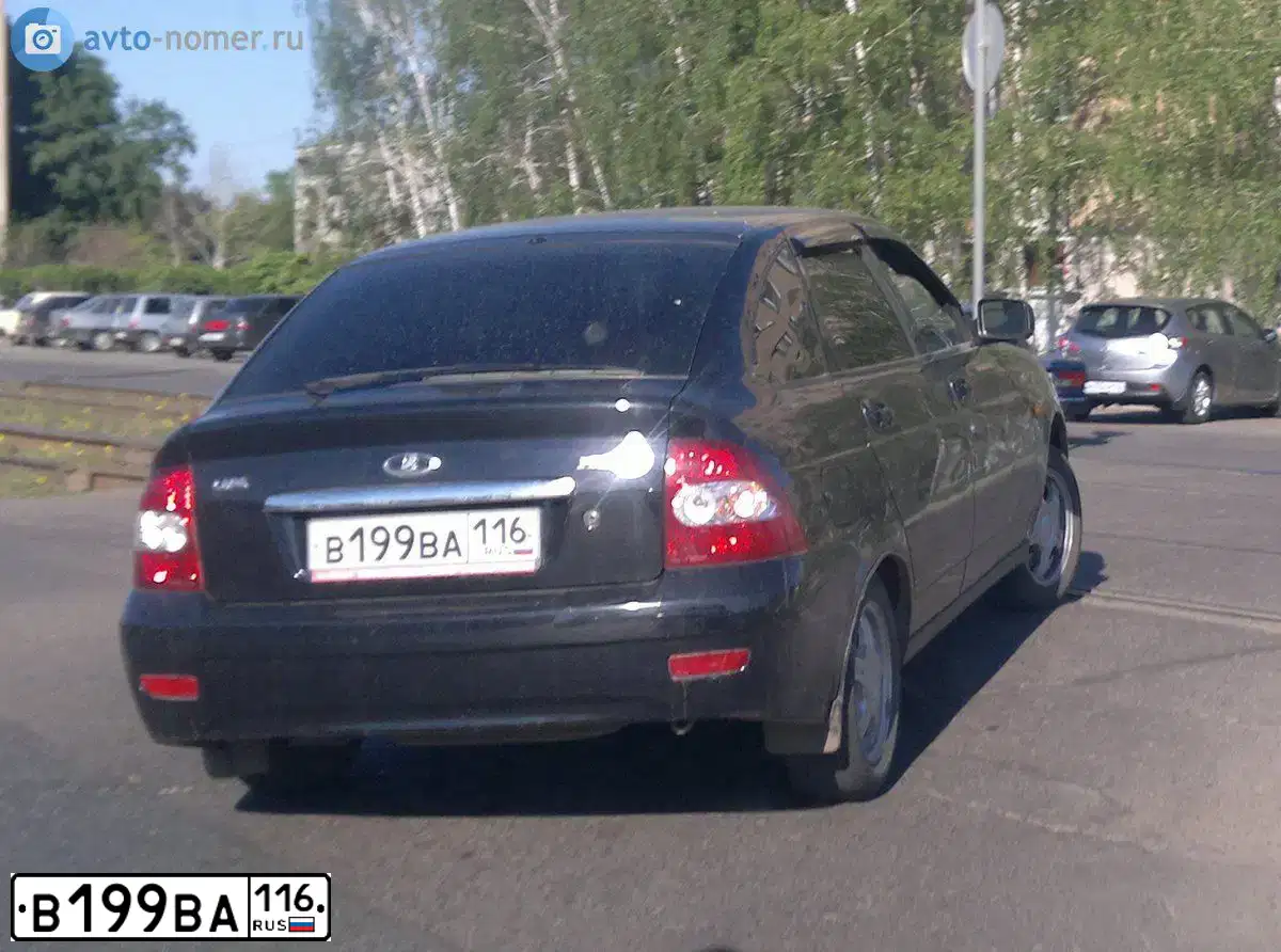 Фото автомобиля LADA 2172 PRIORA, 2010 — госномер М085ВК702. Цвет: Сине-Черный