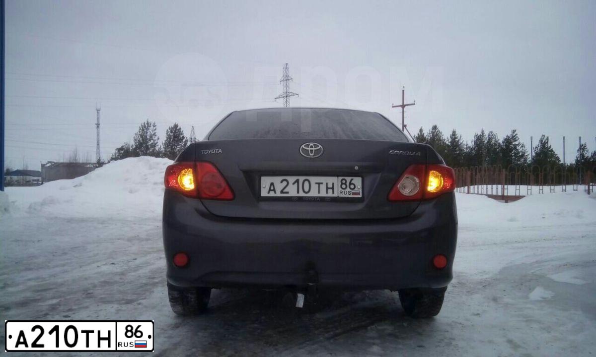 Фото автомобиля TOYOTA COROLLA, 2008 — госномер Н240ЕЕ196. Цвет: СЕРЫЙ