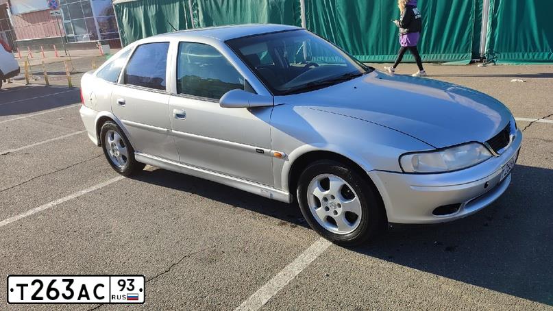 Фото автомобиля OPEL VECTRA, 1999 — госномер М149ОЕ82. Цвет: СВЕТЛО-СЕРЫЙ
