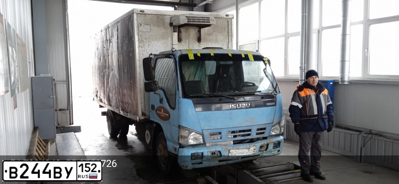 Фото автомобиля ISUZU NQR, 2009 — госномер А273КВ152. Цвет: синий