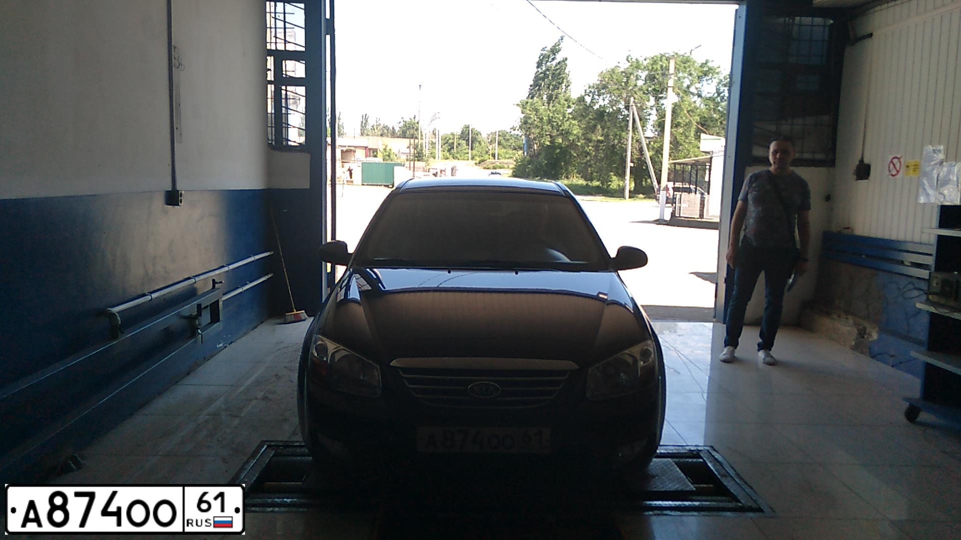Фото автомобиля KIA CERATO, 2007 — госномер А874ОО61. Цвет: ЧЕРНЫЙ