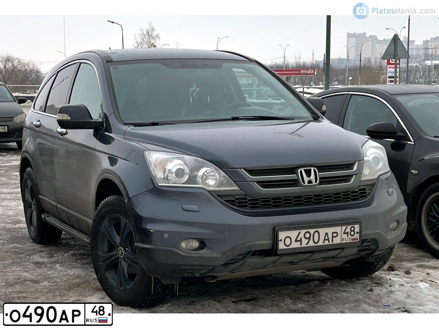 Фото автомобиля HONDA CR-V, 2012 — госномер М010РК48. Цвет: ТЕМНО-СЕРЫЙ