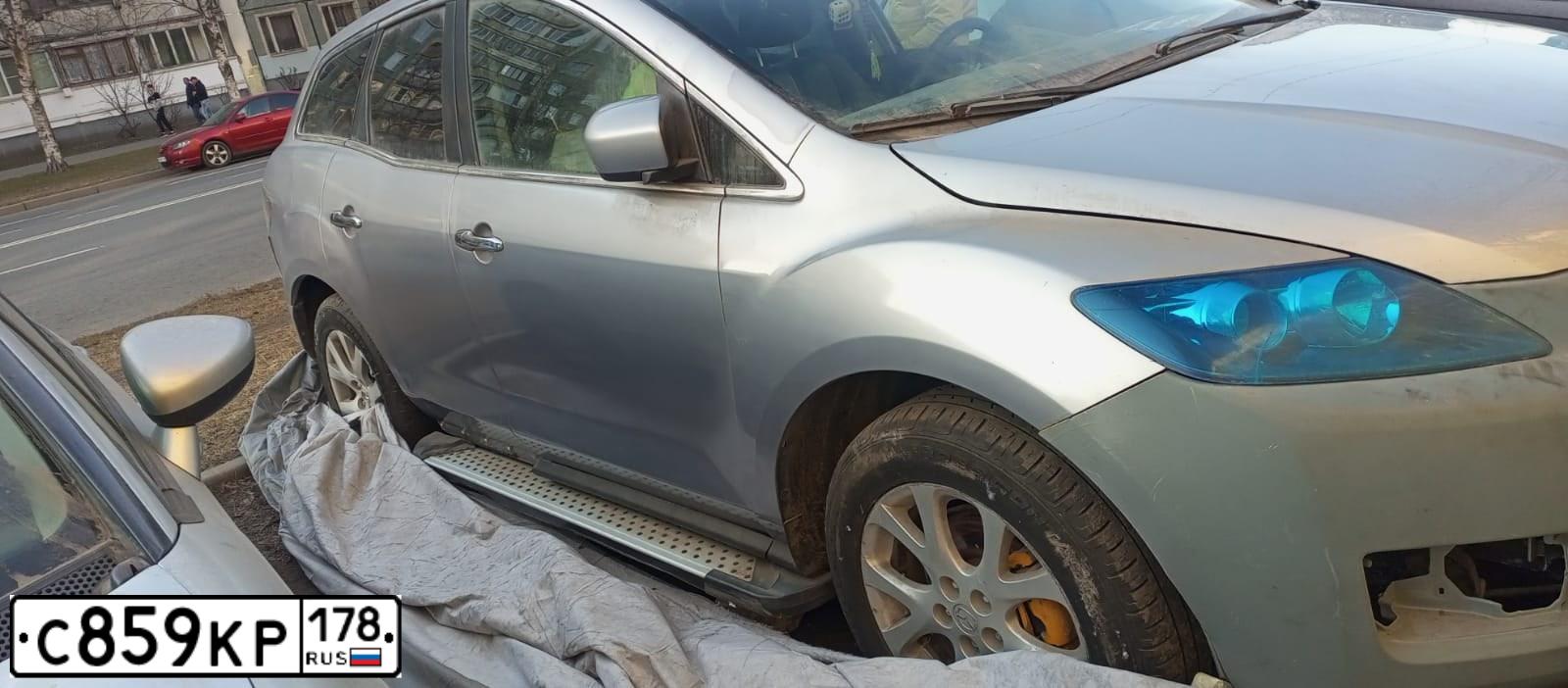 Фото автомобиля MAZDA CX-7, 2007 — госномер С859КР178. Цвет: СЕРО-ГОЛУБОЙ