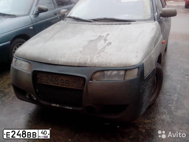 Фото автомобиля LADA 2112, 2001 — госномер Е248ВВ40. Цвет: БЕЛЫЙ