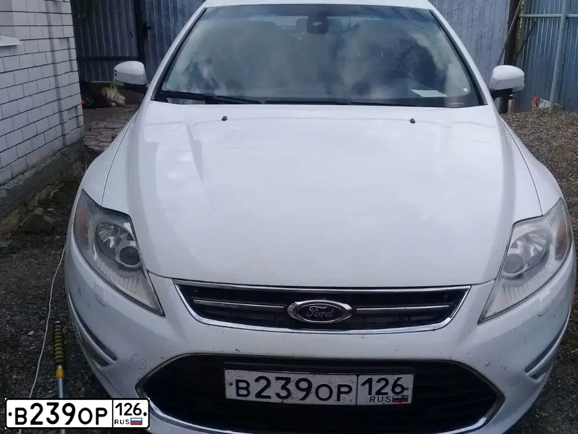 Фото автомобиля FORD MONDEO, 2012 — госномер Х050ХВ26. Цвет: БЕЛЫЙ