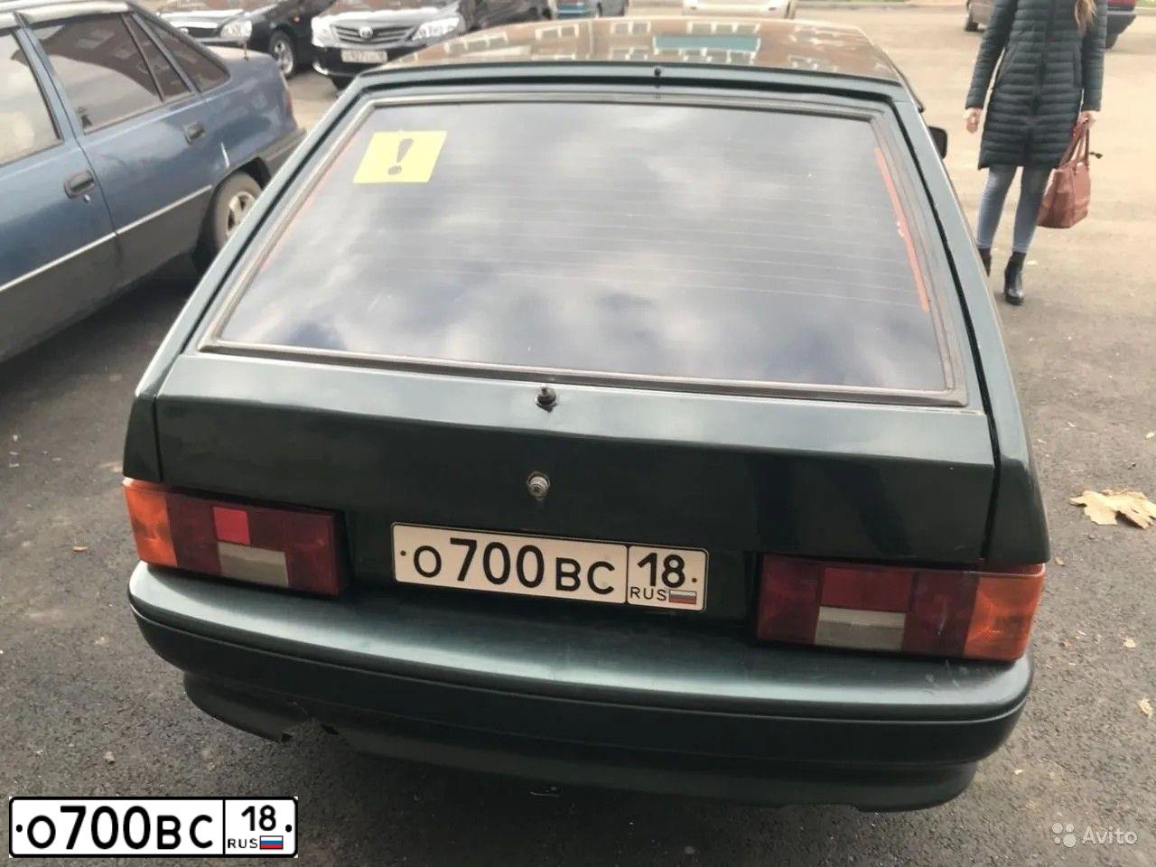 Фото автомобиля LADA 2114 SAMARA, 2004 — госномер О700ВС18. Цвет: ТЕМНО-ЗЕЛЕН.