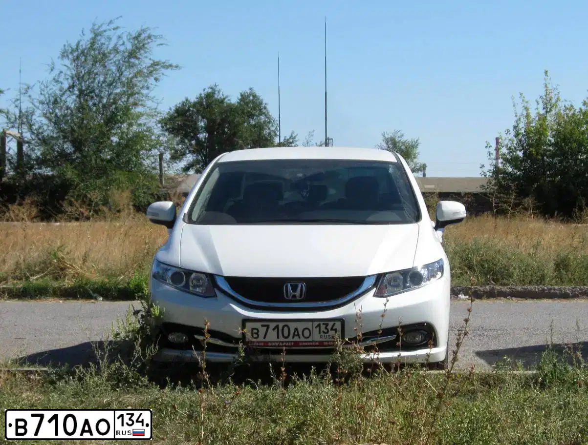 Фото автомобиля HONDA CIVIC, 2014 — госномер А335ХМ92. Цвет: Белый