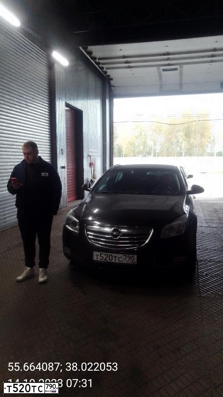 Фото автомобиля OPEL INSIGNIA, 2012 — госномер Т520ТС790. Цвет: Коричневый