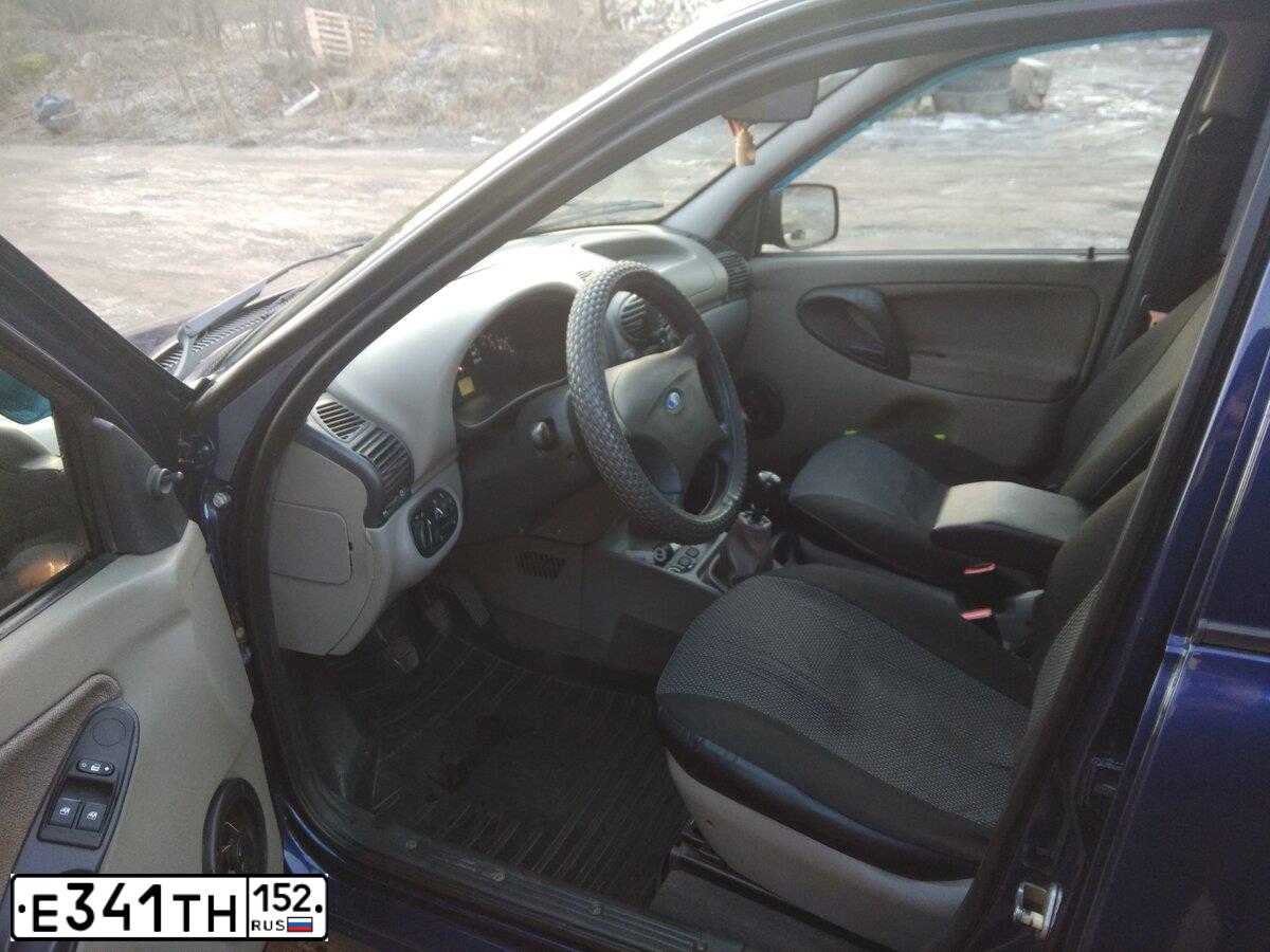 Фото автомобиля LADA 1117 KALINA, 2011 — госномер Е341ТН152. Цвет: СВЕТЛО-ЗЕЛЕНЫЙ