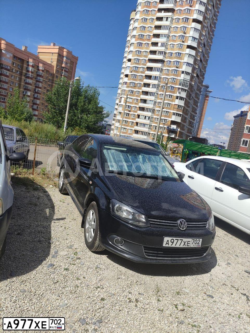 Фото автомобиля VOLKSWAGEN POLO, 2012 — госномер А977ХЕ702. Цвет: ЧЕРНЫЙ
