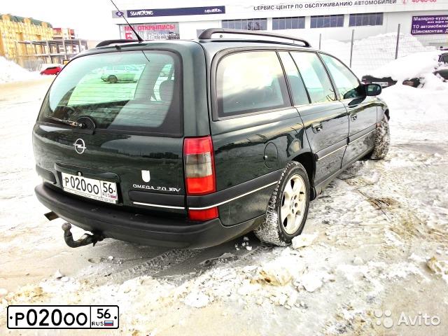 Фото автомобиля KIA SPECTRA, 2007 — госномер В657АР156. Цвет: ЧЕРНЫЙ ЖЕМЧУГ