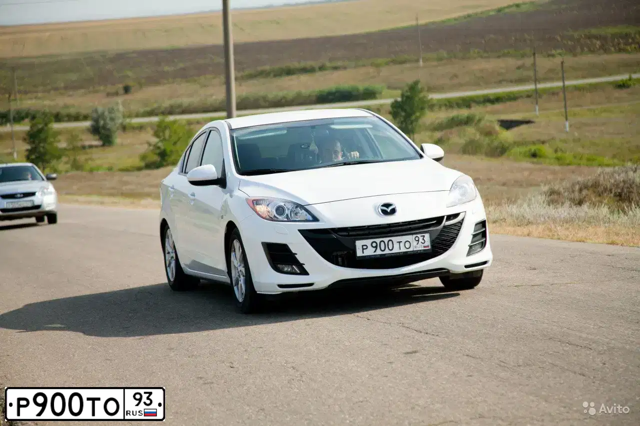 Фото автомобиля MAZDA 3, 2009 — госномер А801ХК123. Цвет: БЕЛЫЙ