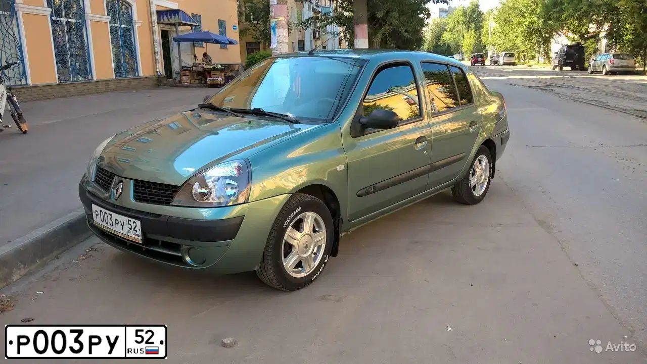 Фото автомобиля RENAULT SYMBOL, 2005 — госномер Р003РУ52. Цвет: СЕРО-ЗЕЛЕНЫЙ