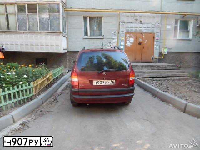 Фото автомобиля OPEL ZAFIRA, 2000 — госномер Н753СК161. Цвет: ВИШНЕВЫЙ