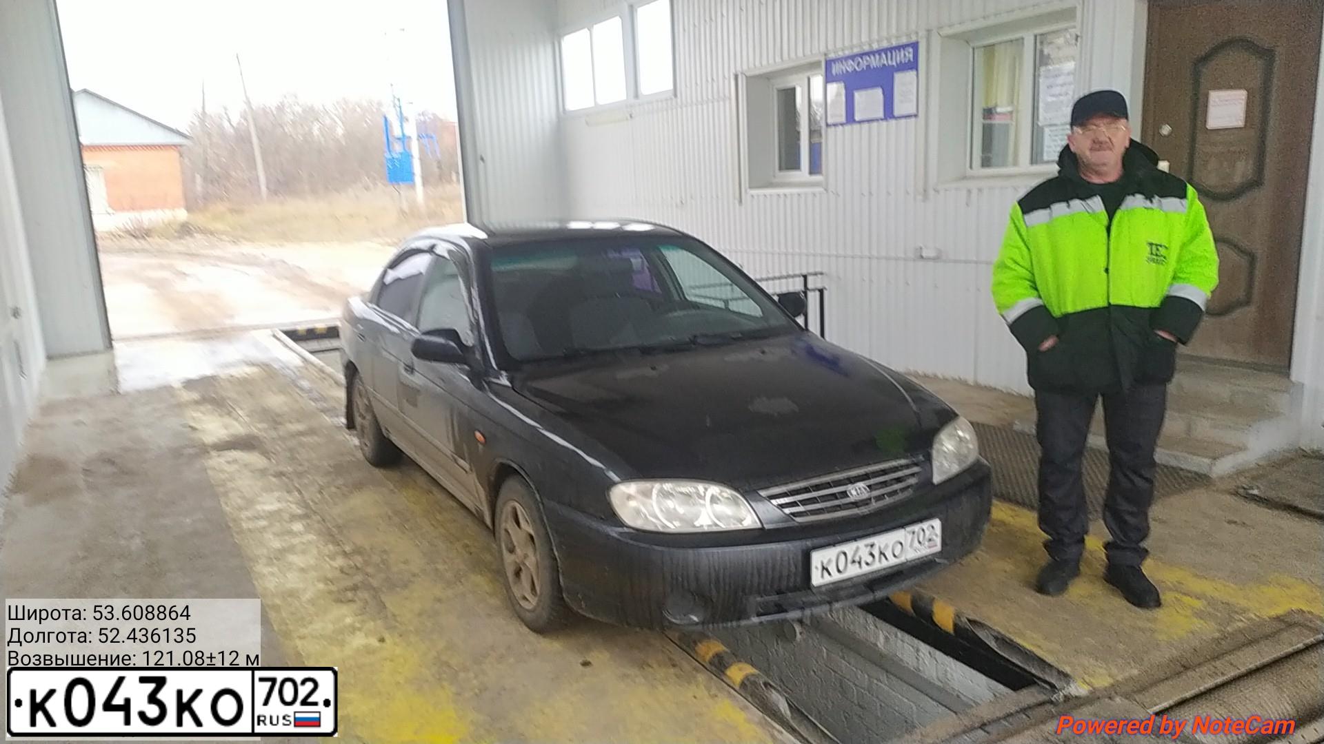 Фото автомобиля KIA SPECTRA, 2007 — госномер К003КС702. Цвет: ЧЕРНЫЙ МЕТАЛЛИК
