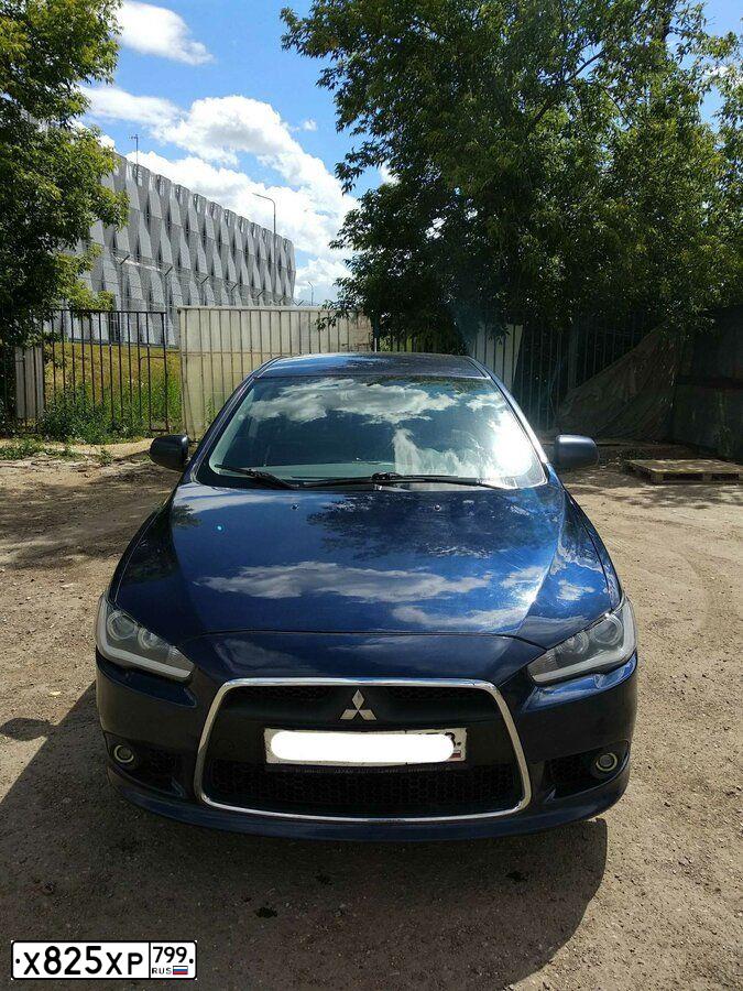 Фото автомобиля MITSUBISHI LANCER, 2012 — госномер Т397МХ761. Цвет: синий