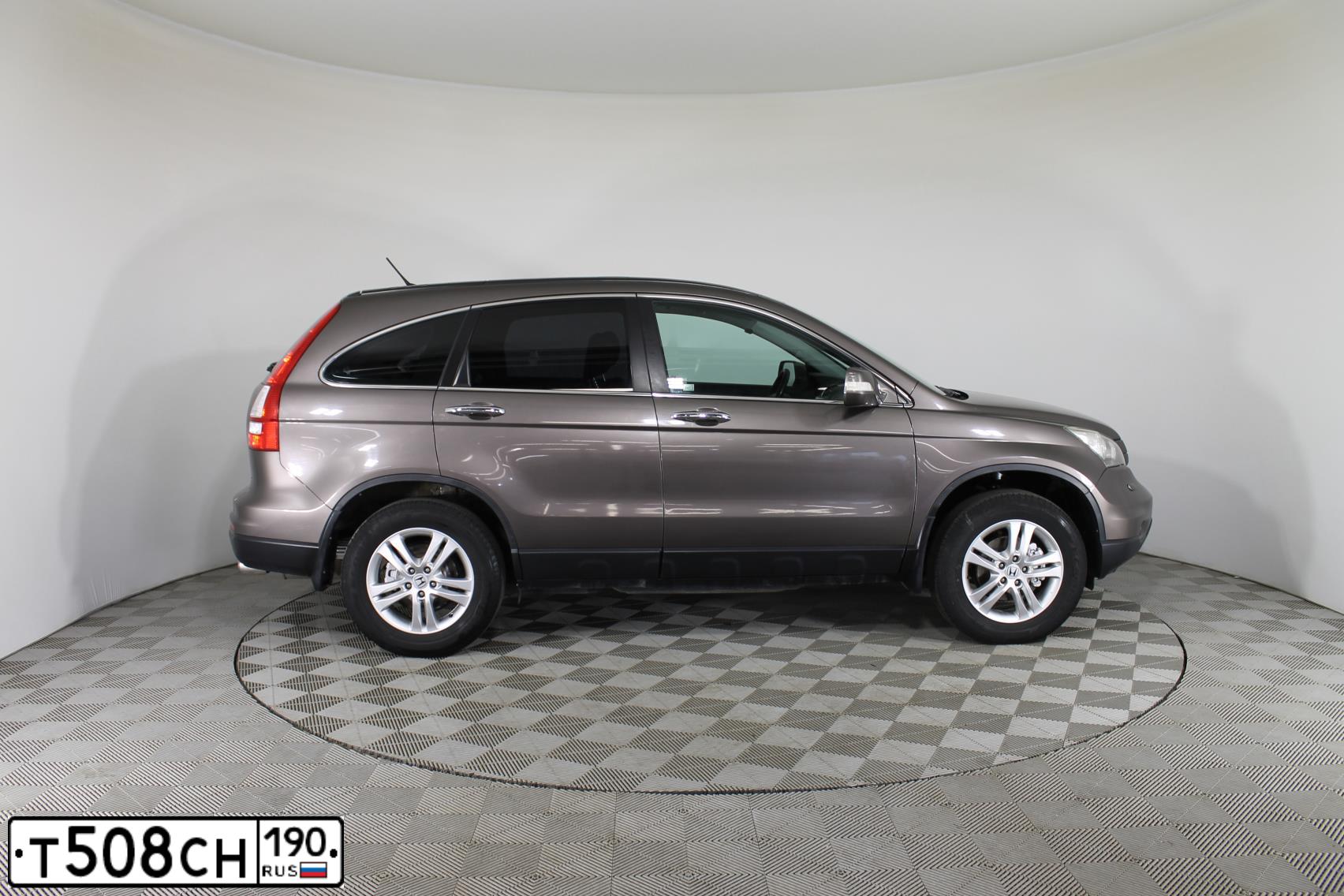 Фото автомобиля HONDA CR-V, 2011 — госномер Т508СН190. Цвет: КОРИЧНЕВЫЙ