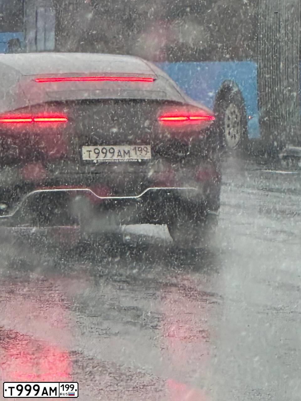 Фото автомобиля AUDI Q7, 2009 — госномер Т999АМ199. Цвет: ЧЕРНО-СЕРЫЙ