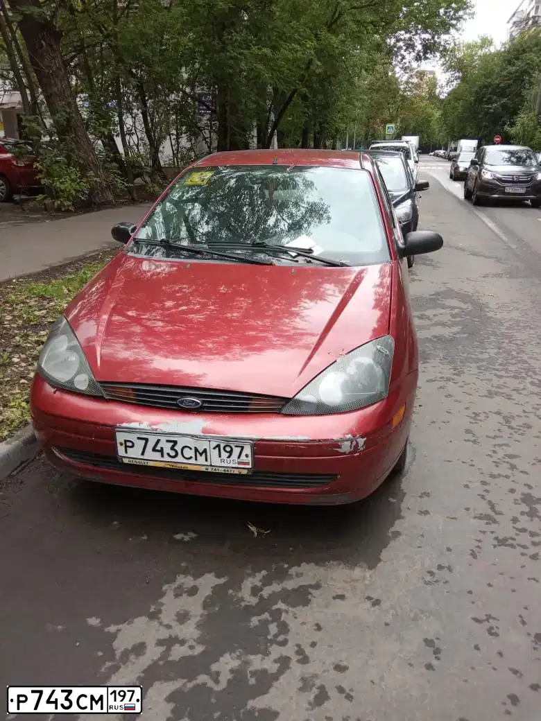 Фото автомобиля FORD D FOCUS, 2003 — госномер М542ТВ67. Цвет: БОРДОВЫЙ