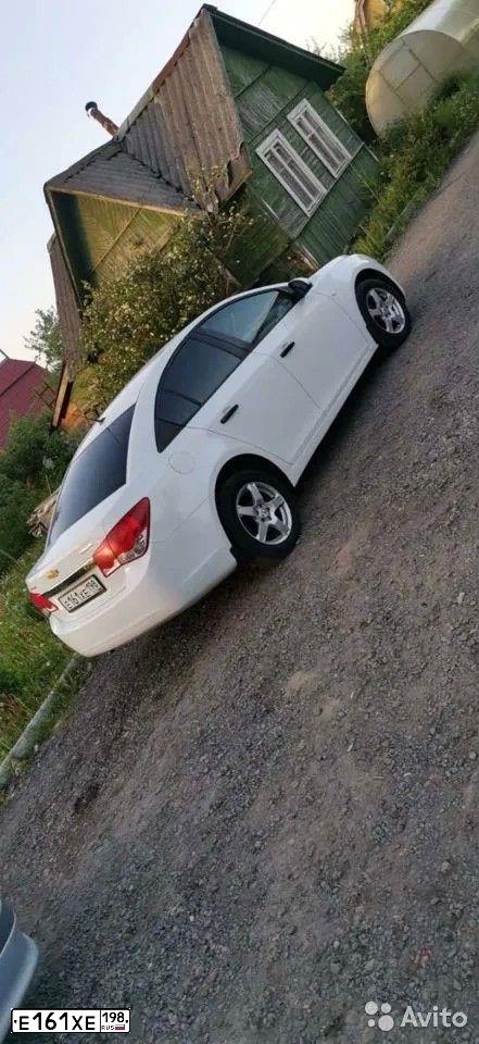 Фото автомобиля CHEVROLET CRUZE, 2012 — госномер Н037СО702. Цвет: Белый