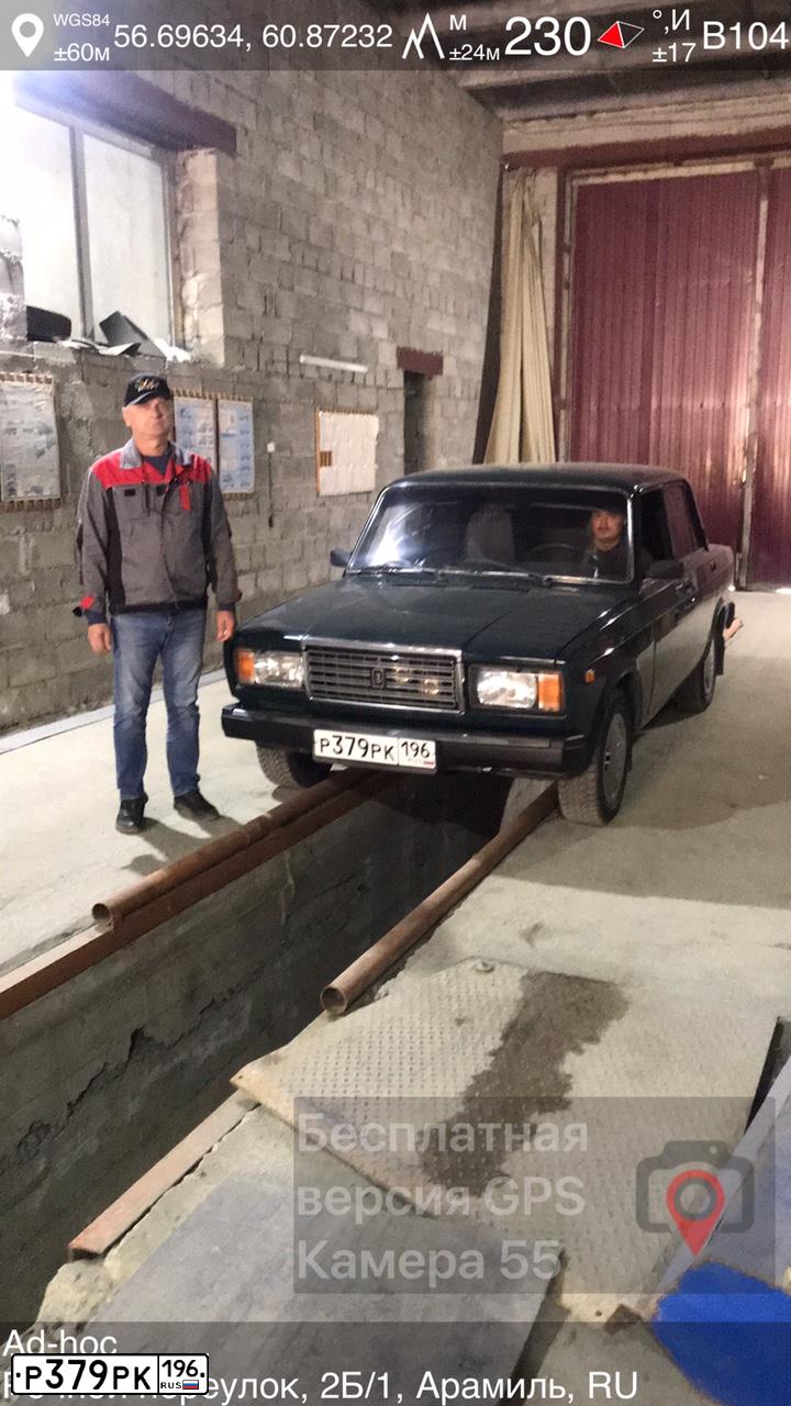 Фото автомобиля LADA 2107 LADA, 2009 — госномер О055РР32. Цвет: Темно-зеленый