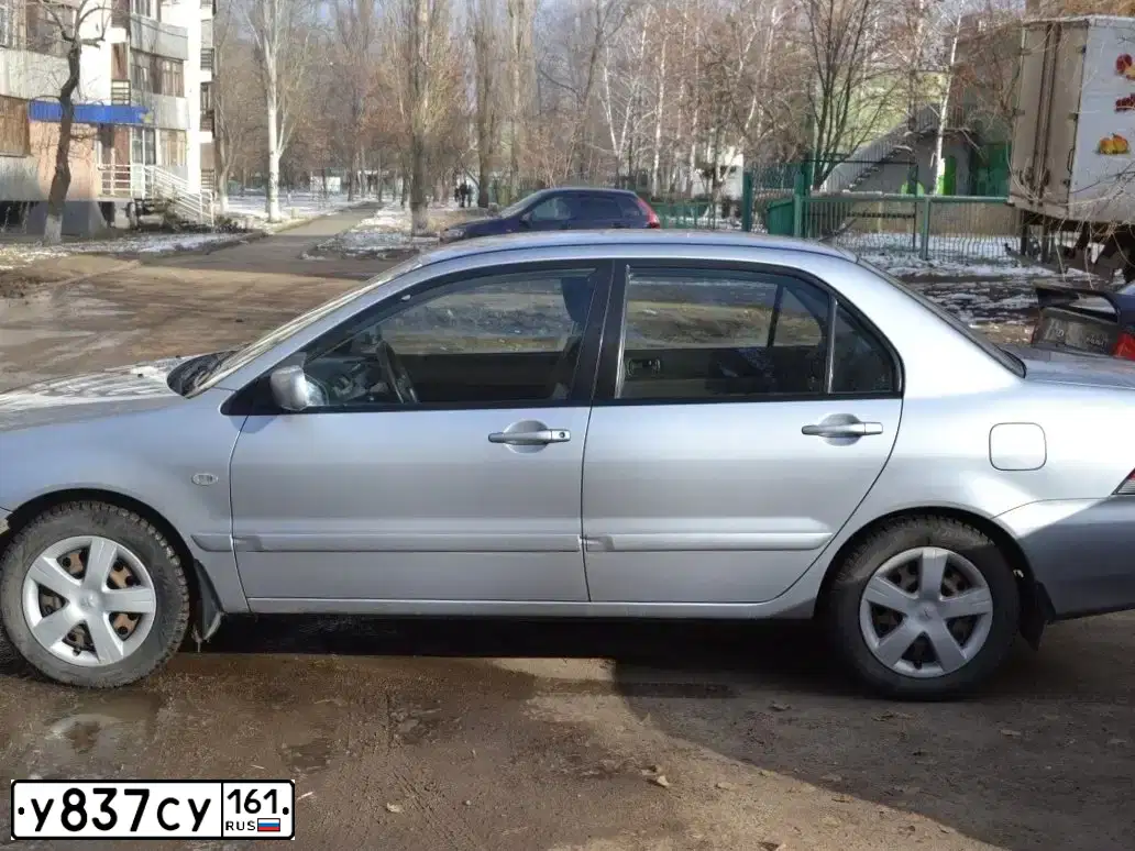 Фото автомобиля CHEVROLET AVEO, 2008 — госномер С268УЕ69. Цвет: Серебристый