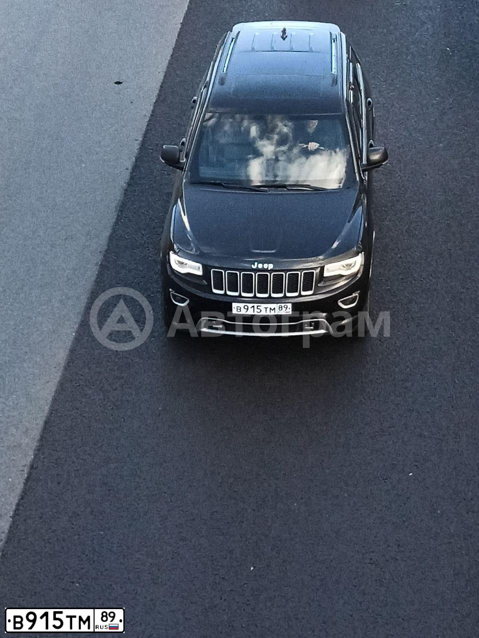 Фото автомобиля JEEP GRAND CHEROKEE, 2015 — госномер Е838ЕА178. Цвет: ЧЕРНЫЙ