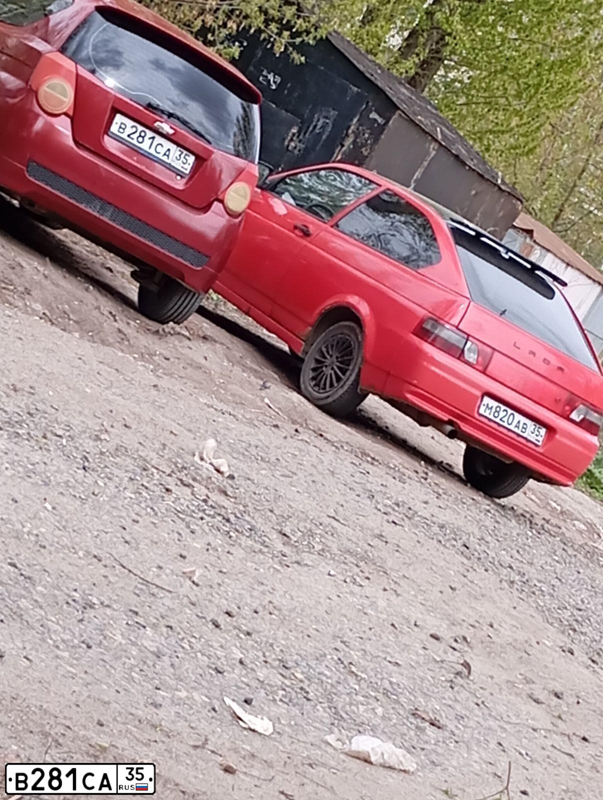 Фото автомобиля CHEVROLET AVEO, 2009 — госномер В281СА35. Цвет: ТЕМНО-КРАСНЫЙ