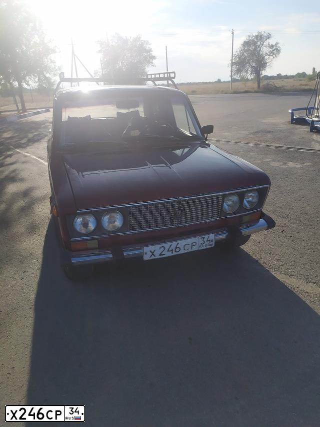 Фото автомобиля LADA 2106, 1996 — госномер Х246СР34. Цвет: КРАСНЫЙ