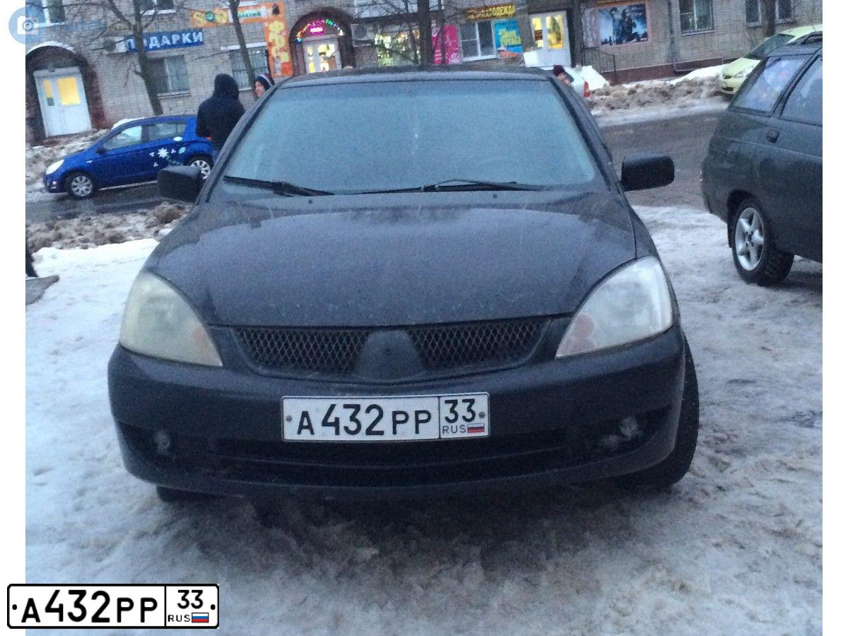 Фото автомобиля MITSUBISHI LANCER, 2006 — госномер Т357КТ33. Цвет: ЧЕРНЫЙ