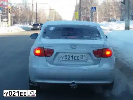 Фото автомобиля NISSAN QASHQAI, 2013 — госномер У021ЕЕ21. Цвет: ЧЕРНЫЙ