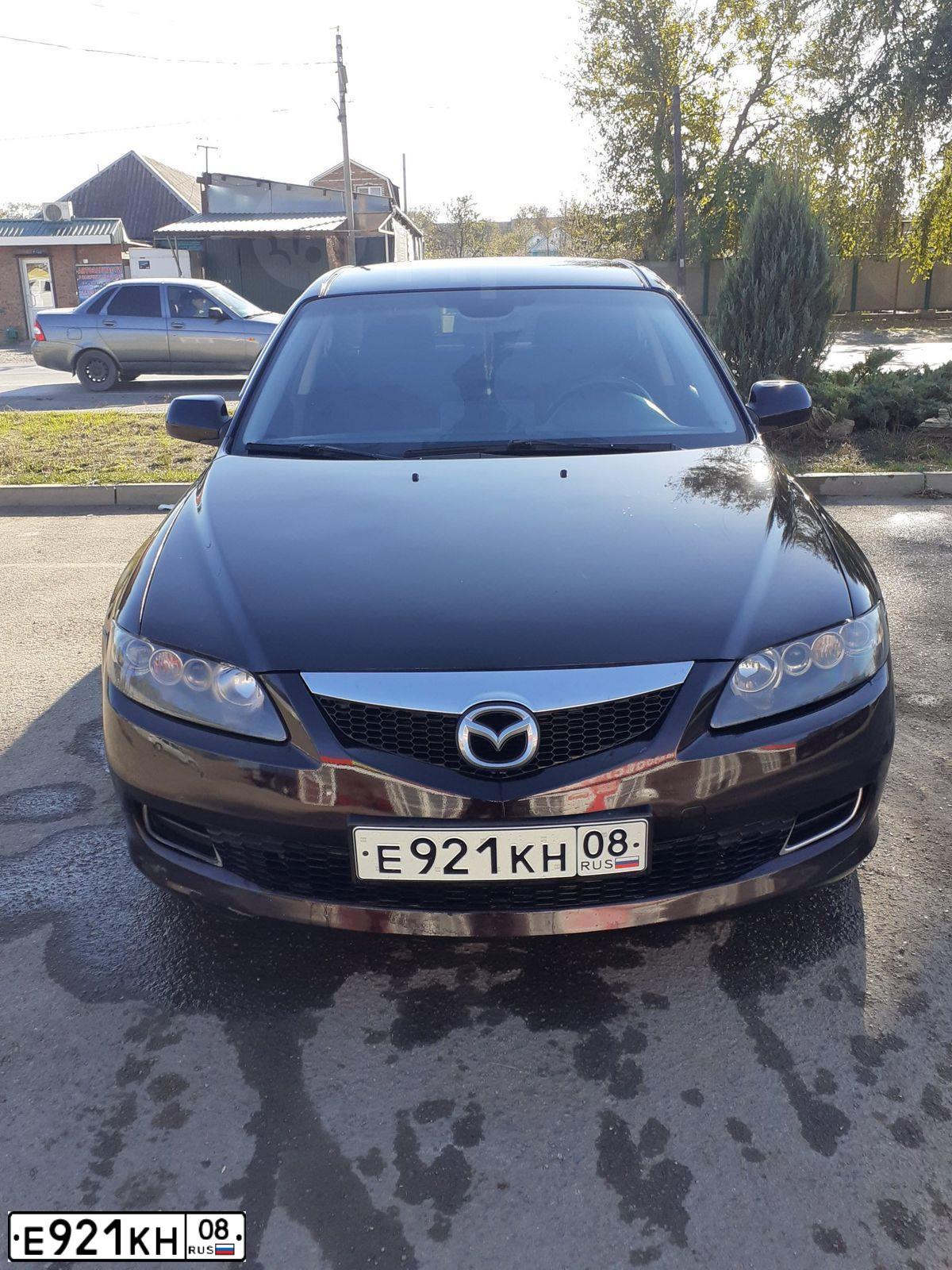 Фото автомобиля MAZDA 6, 2006 — госномер Н020НР126. Цвет: ТЕМНО-ВИШНЕВЫЙ