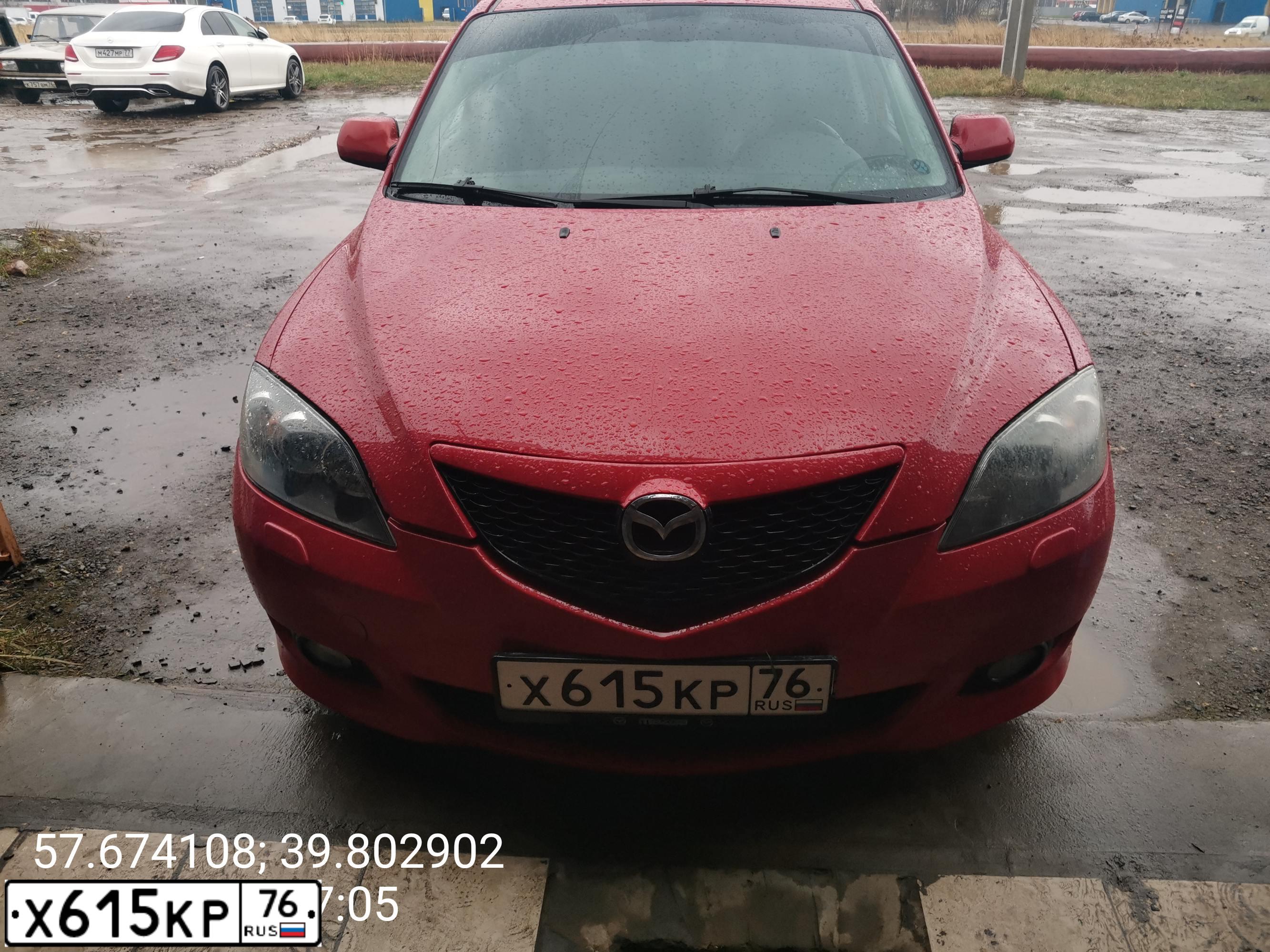Фото автомобиля MAZDA 3, 2006 — госномер Х615КР76. Цвет: Красный