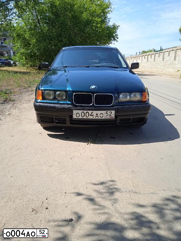Фото автомобиля BMW SERIE 3, 1994 — госномер О004АО52. Цвет: ЗЕЛЕНЫЙ