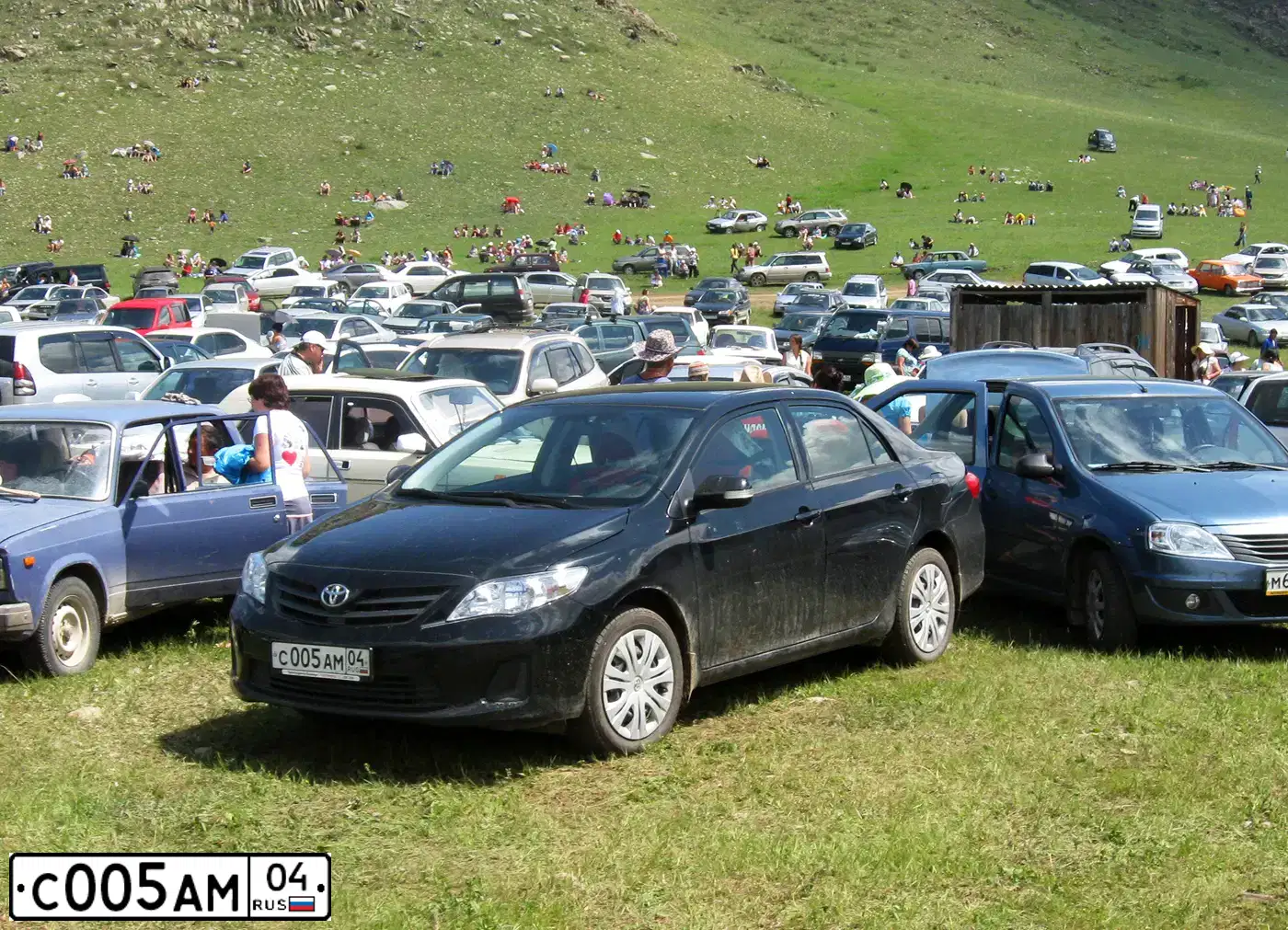 Фото автомобиля TOYOTA COROLLA, 2011 — госномер С005АМ04. Цвет: ЧЕРНЫЙ