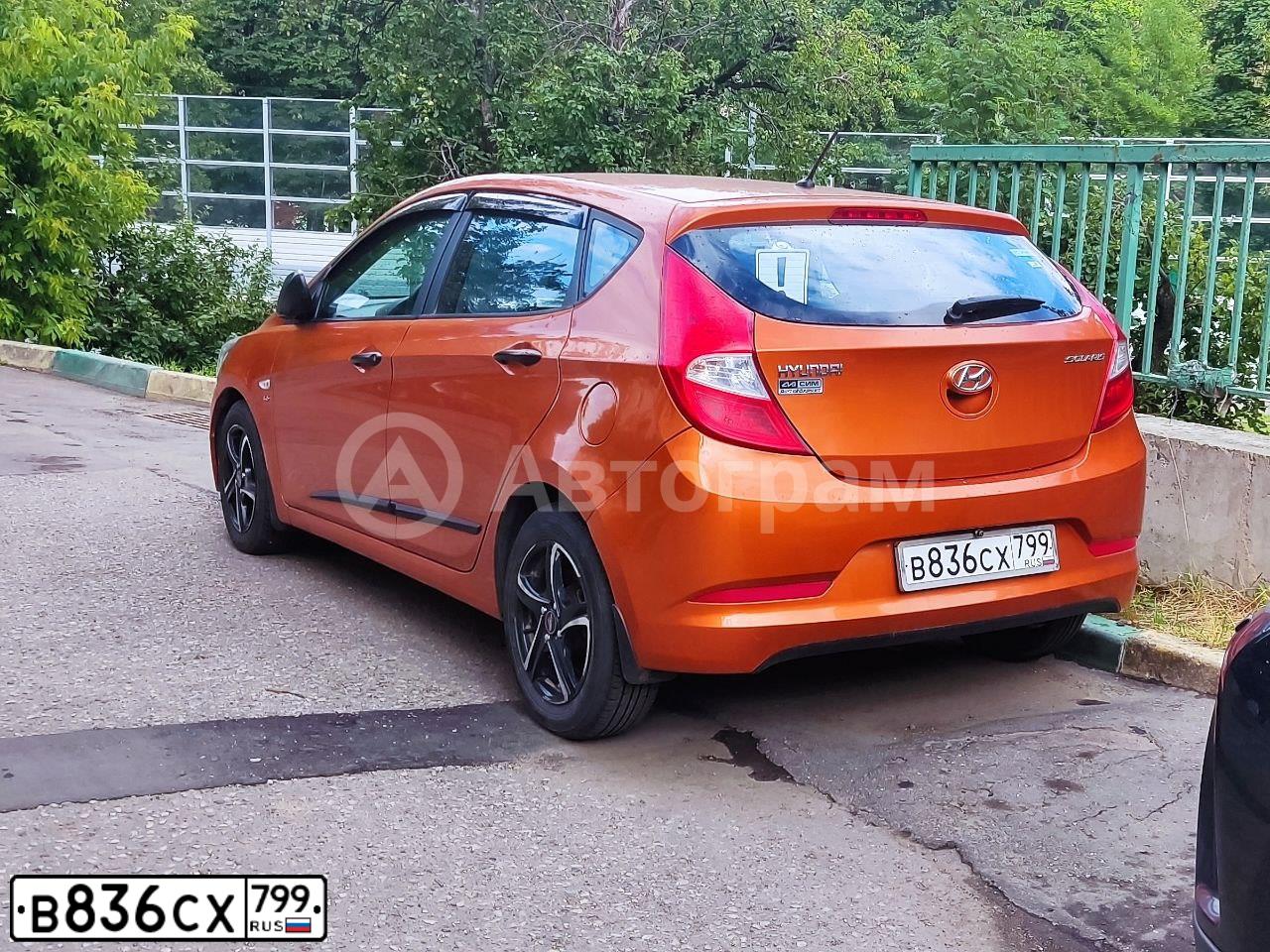 Фото автомобиля HYUNDAI SOLARIS, 2014 — госномер В836СХ799. Цвет: Оранжевый