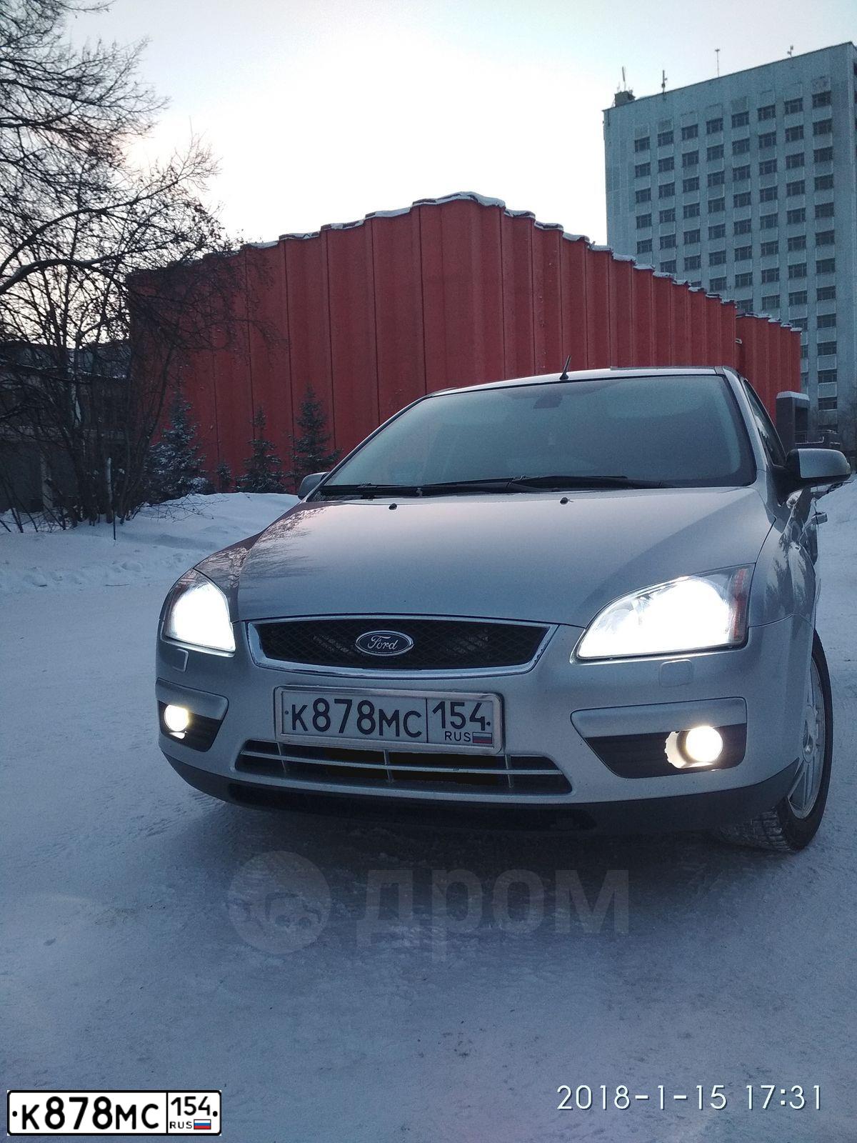 Фото автомобиля FORD FOCUS, 2007 — госномер К878МС154. Цвет: СЕРЕБРИСТЫЙ